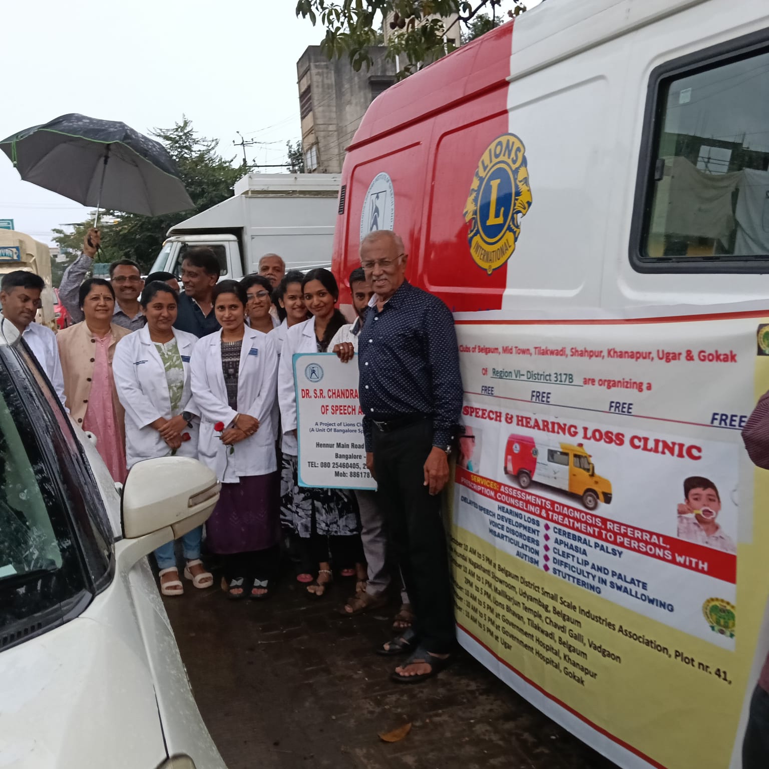 Speech and Hearing Aid Mobile Van arrival and welcoming with Lions members of Lions Clubs of region present
