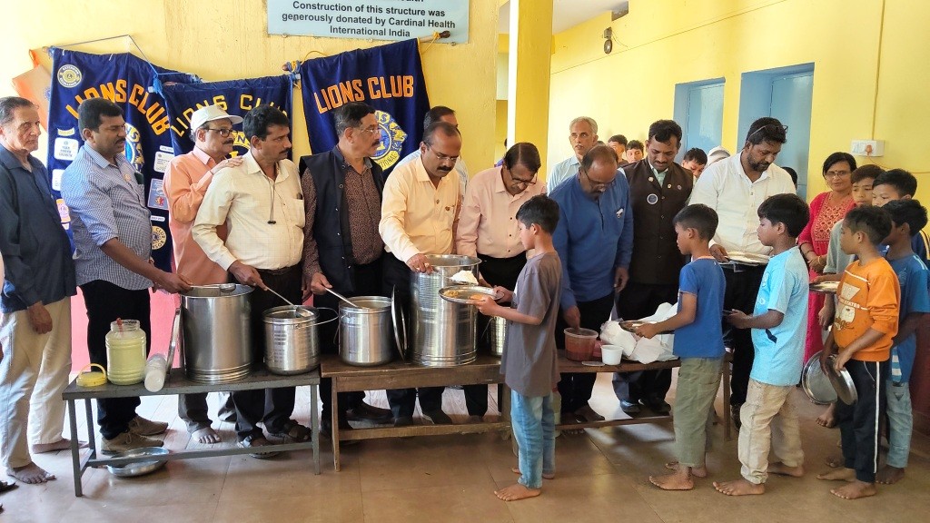 SERVED FOOD TO HOMELESS SCHOOL CHILDREN.