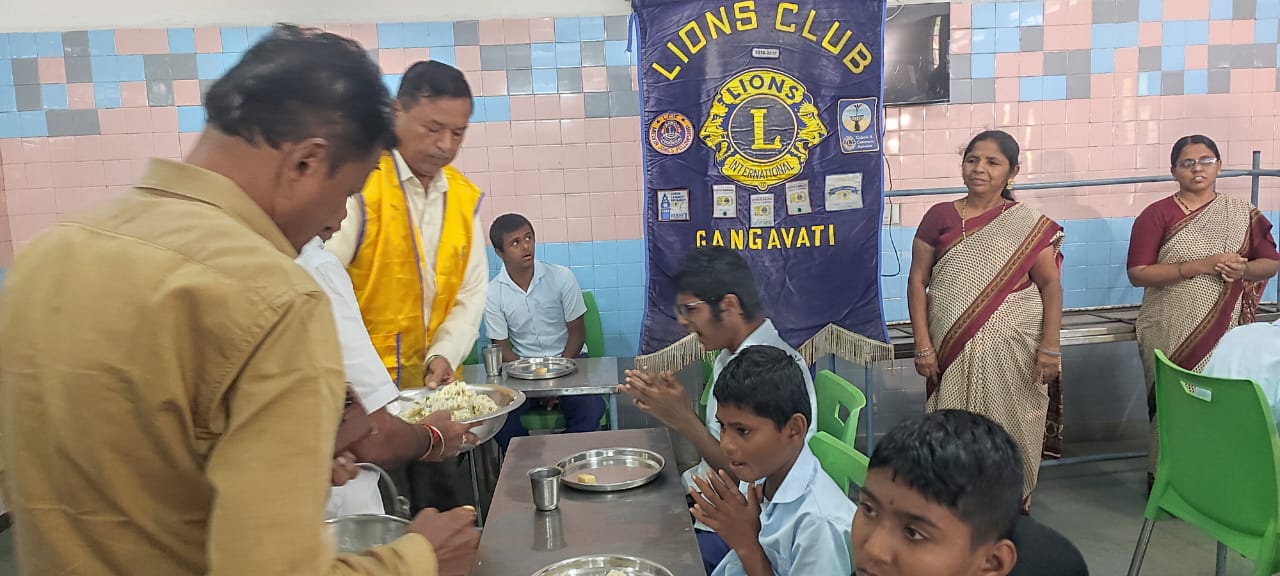 served the prepared meals, fruits and bread to the mentaly retarded students of residential school Gangavathi 