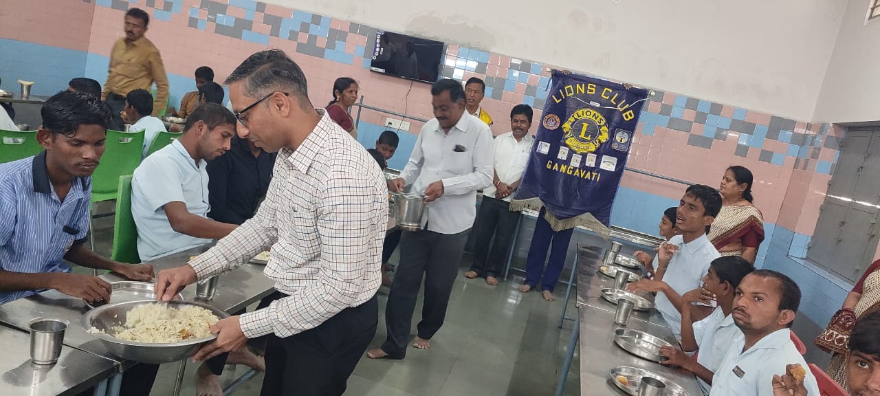 served with prepared meals fruits and bread to the mentaly retarded students of residential school Lions Club Gangavathi. 