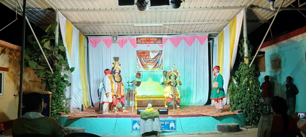 CONDUCTING YAKSHAGANA CULTURAL ACTIVITY UNDER COMMUNITY AWARENESS.