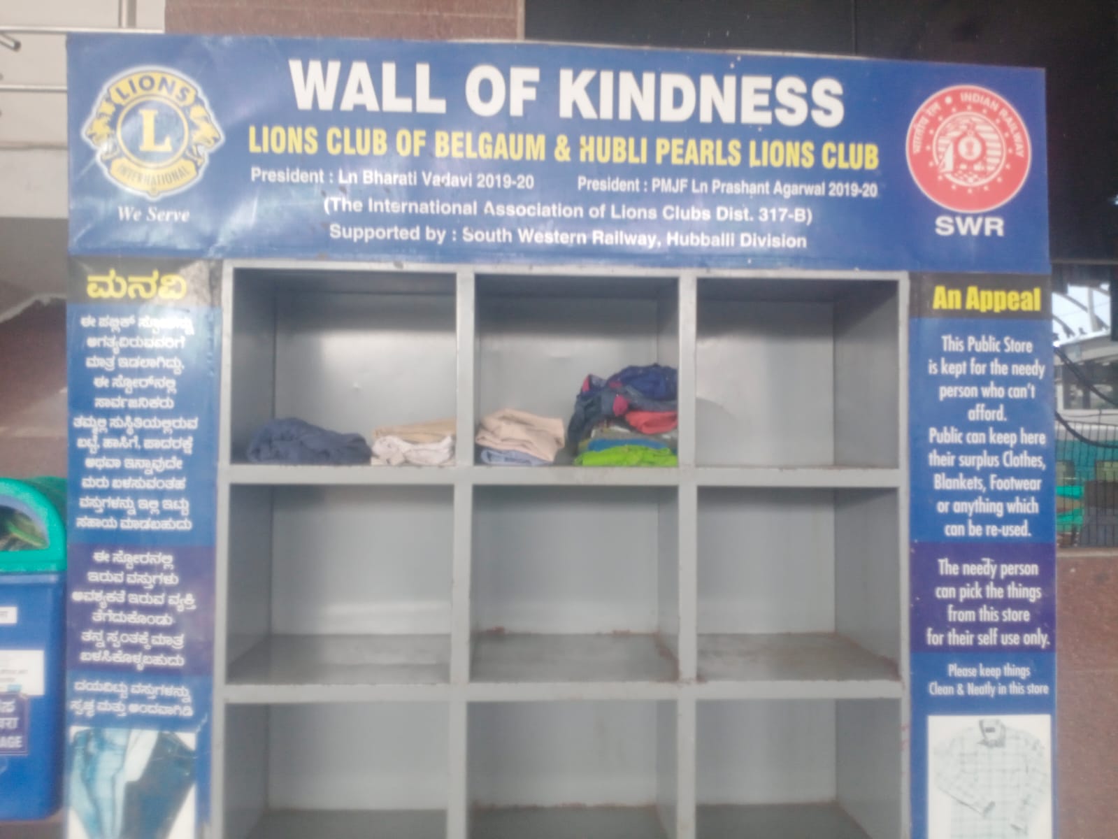 Cleaning and replenishing Wall of Kindness