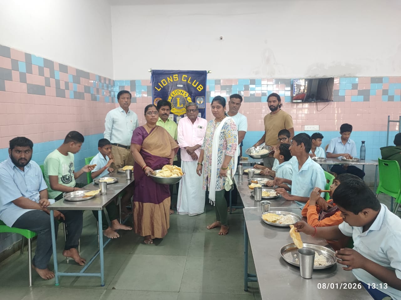 Distribution of food to mentally challenged children