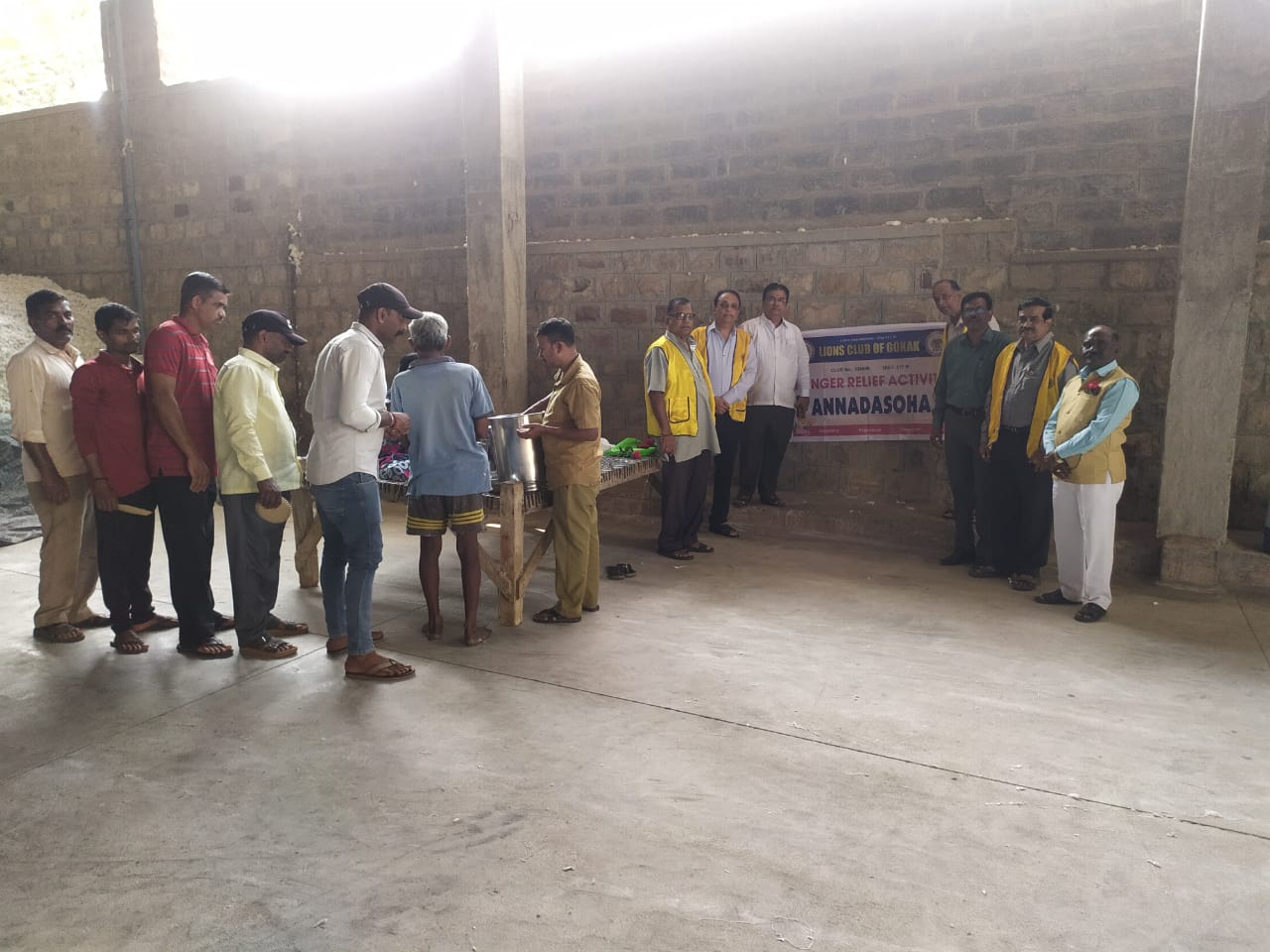 DISTRIBUTION OF READY FOOD TO LABOURS