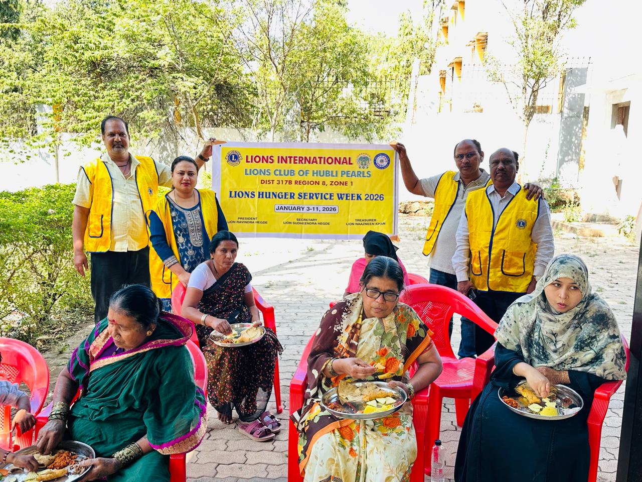 worldwide week of service-hunger (Serving ready food.)