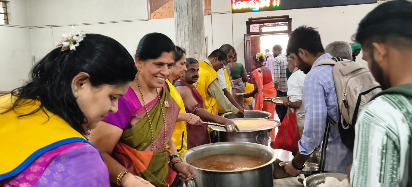 READY MEALS DISTRIBUTION TO PILGRIMS AND DEVOTEES OF/IN SRI MARIKAMBA TEMPLE.
