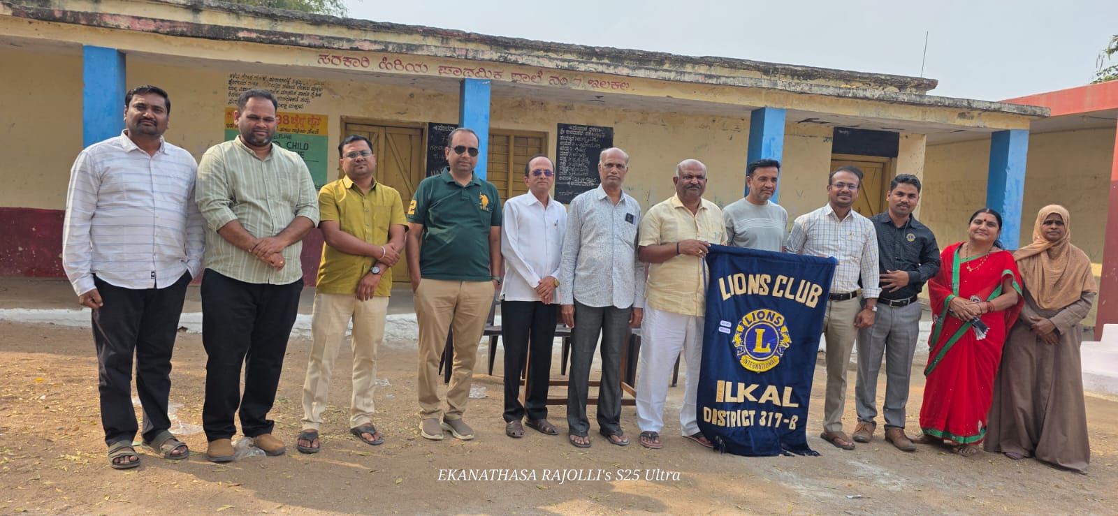 Distribution of notebooks and pen to school students 
