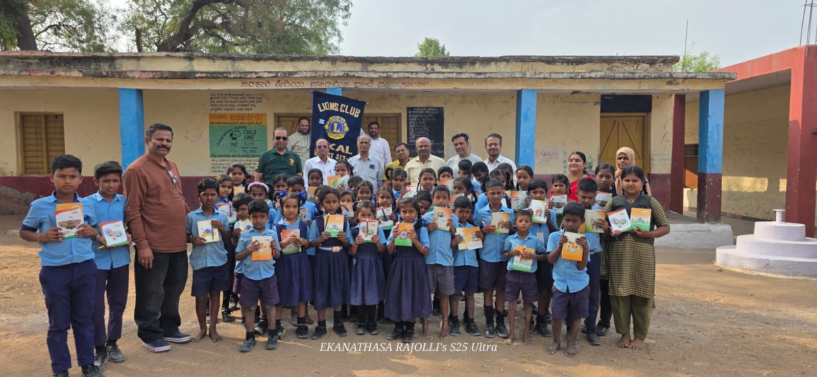 Distribution of notebooks and pen to school students 