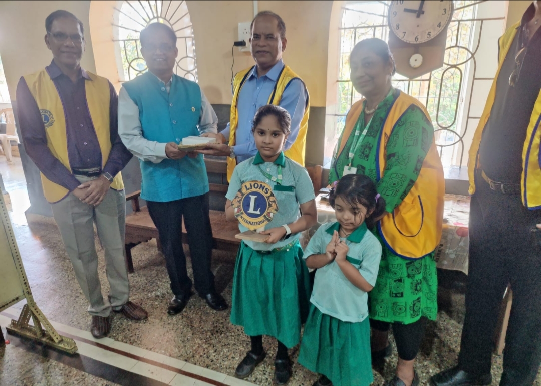 Conducting tutorial class for village students on Vedic Mathematics